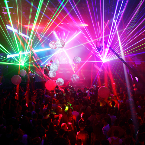 Keobin Colorful RGB laser light show with fan beams over a crowd at a nightclub event