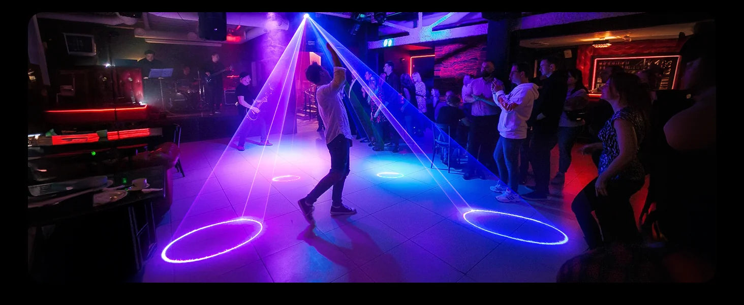 KeoBin L2600 laser party light energizing a club dance floor