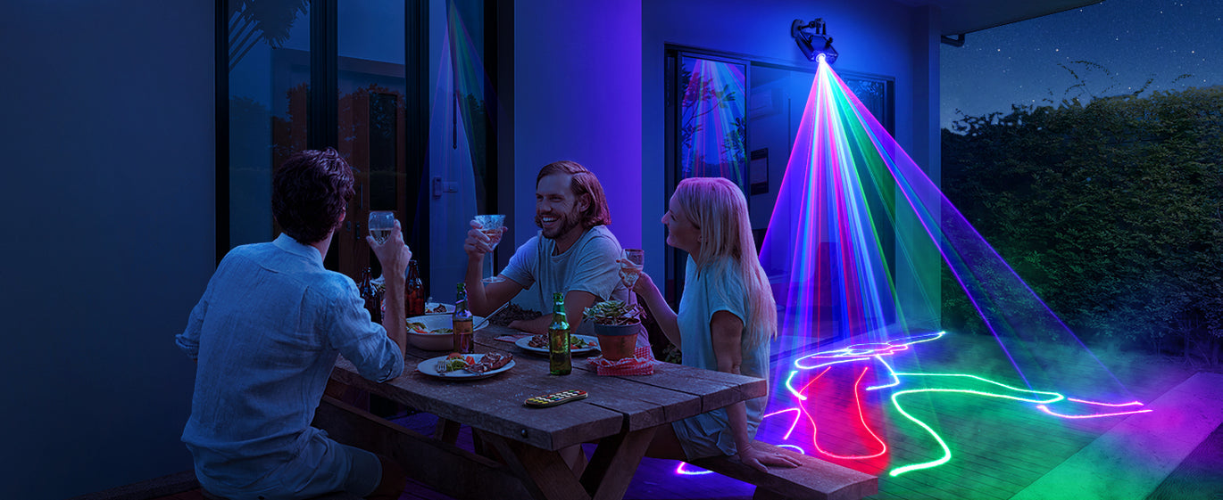 KeoBin party lights creating colorful beams in a room